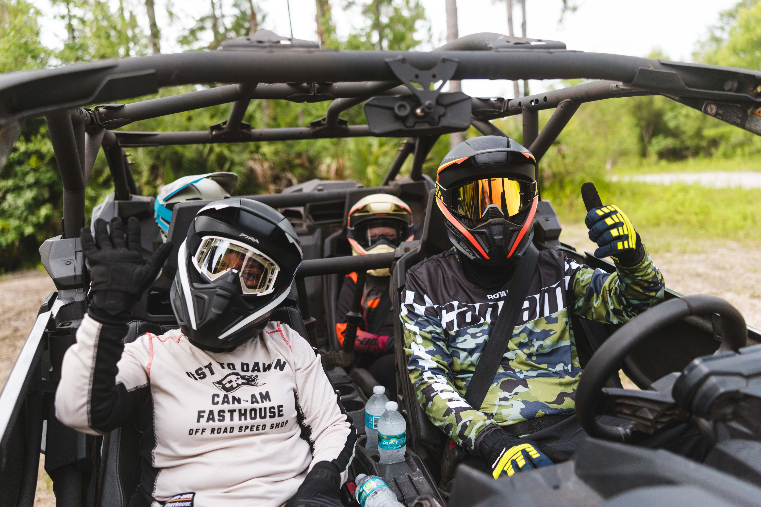 Guests riding Can-Am ATVs with Luxe at a private ranch near Daytona Beach, Florida